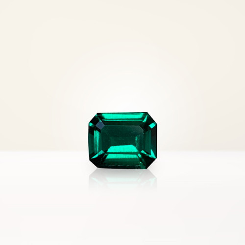 0.61 ct Emerald Cut Green Lab Emerald - Nolan and Vada