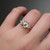 S819-FLORA-YG-NVST815 - Ring on Hand