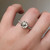 S807-SERENITY-WG-NVST815 - Ring on Hand