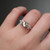 S819-FLORA-RG-NVST1558 - Ring on Hand