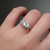 S819-FLORA-WG-NVST1592 - Ring on Hand
