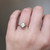 S810-ZOE-RG-NVST1593 - Ring on Hand