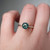 S826-CELINE-WG-NVST1660 - Ring on Hand