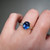S817-CLARA-YG-NVST3610 - Ring on Hand