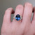 S823-FLEUR-WG-NVST3611 - Ring on Hand