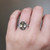 S810-ZOE-WG-NVST3819 - Ring on Hand