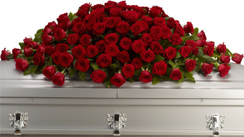 Last Great Love Red Rose Casket Spray from Sympathy Flower Shop. This loving, flowing embrace of rich, regal roses in an all-red sympathy spray can adorn the casket cover spray.  Our full spray of red crimson roses is designed beautifully for one last farewell.
SKU SYM801