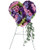 Graceful Purple and Lavender Heart Tribute Flowers from Sympathy Flower Shop. This heart-shaped sympathy tribute is covered with lavender roses, blue iris and blue hydrangeas and purple chrysanthemums and arrives on a wire funeral easel. Approximately 20" W x 24" H
SKU SYM107