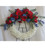 Stars and Stripes Patriotic Funeral Wreath Flowers by Enchanted Florist. Sympathy flowers include red roses, red gerberas daisies, blue hydrangeas and blue delphinium (similar to blue bonnets). Send a patriotic sympathy flower wreath delivery today to most Houston and Pasadena funeral homes. Approximately 23"H x 30"W (does not include stand size)
SKU RM542