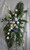 Galaxy Wide Blue and White Funeral Flowers Spray from Enchanted Florist. One of our largest sprays in blue and whites, our custom spray includes large white calla lilies, one dozen white roses. blue hydrangeas, white stock, white snapdragons, and lots of green foliage to set the design off. Approximately 70"H x 40"W (size not including stand)
SKU RM548