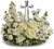 Crystal Cross Sympathy Arrangement by Sympathy Flower Shop. A fragrant mix of pure white blooms - including roses, alstroemeria, stock, carnations and waxflower. Includes an exclusive Crystal Cross keepsake for the family. Your #1 Houston funeral florist. SKU SYM416