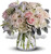 Whispering Love Sympathy Bouquet by Sympathy Flower Shop. Gorgeous flowers such as white, crème and light pink roses, white oriental lilies and filler flowers with a touch of silvery dusty miller, all in a classic clear vase. Your Pearland funeral florist. SKU SYM422