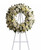 White Rose Serenity Funeral Wreath Spray from Sympathy Flower Shop. A standing funeral wreath created from fresh white flowers such as roses, Asiatic lilies, carnations and cushions - accented with greenery - is delivered on an easel. Approximately 22" W x 22" H (Size does not include easel)
SKU SYM201