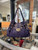 Jimmy Choo purple handbag