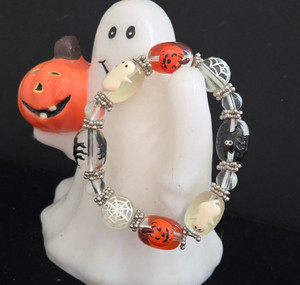 Painted Ghost, Pumpkin, Spider, Web Stretch Glass Beaded Bracelet. Painted Ghost, Pumpkin, Spider, Web Stretch Glass Beaded Bracelet.