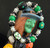 Painted Green Sugar Skull Glass Beaded Stretch Bracelet.