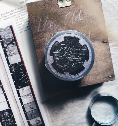 Mr. Eggplants Skyline PET Tape, 2.5cm wide, featuring a vintage film-strip design with scenic landscape photos and matte finish. Ruban adhésif PET Skyline par Mr. Eggplants, 2,5 cm de large, avec un design de pellicule de film vintage et des photos de paysages.