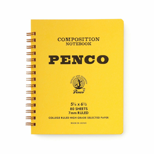 Penco Coils Notebook M in Yellow, featuring a bright yellow board cover with a bold letterpress logo and 7mm ruled paper with a red margin. Carnet à spirales Penco Coils taille M en jaune, avec une couverture en carton jaune vif, logo typographique et pages lignées de 7 mm avec marge rouge.