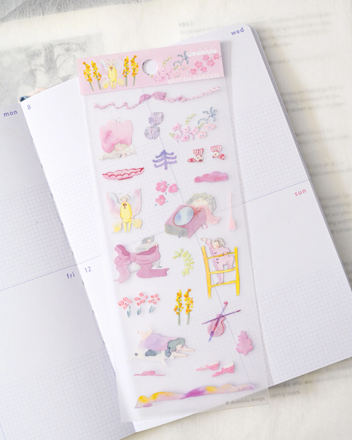 dodolulu Matte Sticker Sheet British Garden featuring delicate florals and vintage botanicals. / Planche d'autocollants mats dodolulu British Garden présentant des fleurs délicates et des motifs botaniques vintage.