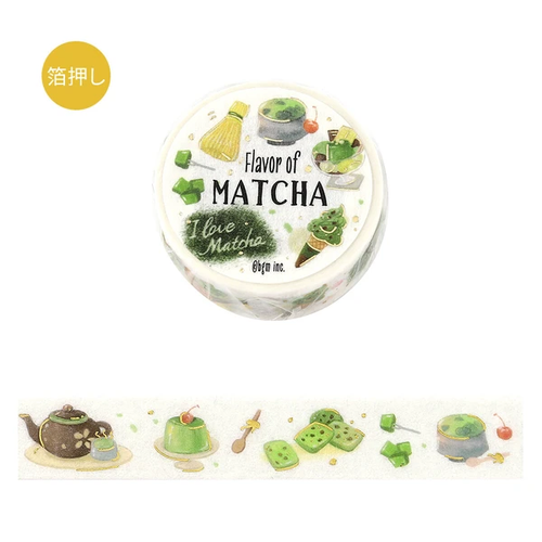 BGM Tokimeki Flavour Washi Tape Matcha (1.5 cm). A 15 mm × 5 m foil-stamped washi roll of matcha and café-sweet motifs. Ruban washi BGM Tokimeki Flavour Matcha (1,5 cm). Rouleau washi 15 mm × 5 m, matcha et douceurs de café, dorure.