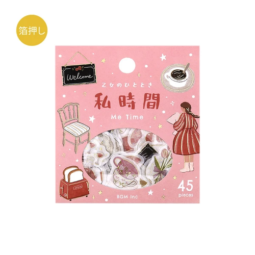 BGM Maiden's Moment Sticker Set Me Time. A foil-stamped flake pack of 45 stickers (15 designs × 3) for a quiet hour at home. Set d’autocollants BGM Maiden's Moment Me Time. 45 stickers dorés (15 motifs × 3) pour un moment à soi à la maison.