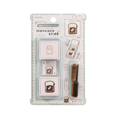 Kutsuwa Hancoco Slide Stamp Bread & Sleeping Dog. An 80 × 30 × 15 mm two-colour slide stamp of bread and a sleeping dog. Tampon Kutsuwa Hancoco Slide Pain et chien endormi. Tampon coulissant deux couleurs 80 × 30 × 15 mm.