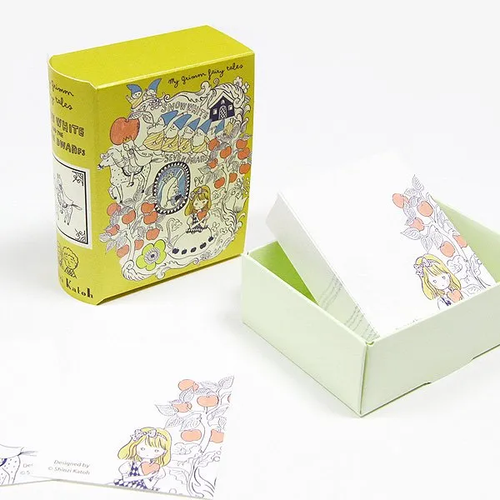 Shinzi Katoh Snow White book memo. A 60 × 80 × 30 mm book case with 140 memo sheets, 52 × 65 mm. Mémo-livre Shinzi Katoh Blanche-Neige. Étui livre 60 × 80 × 30 mm, 140 feuilles 52 × 65 mm.