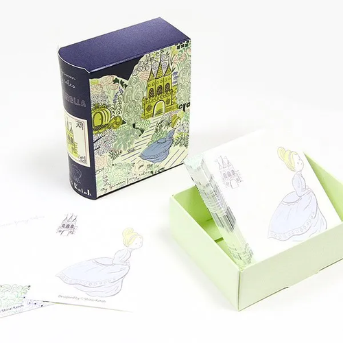 Shinzi Katoh Cinderella book memo. A 60 × 80 × 30 mm book case with 140 memo sheets, 52 × 65 mm. Mémo-livre Shinzi Katoh Cendrillon. Étui livre 60 × 80 × 30 mm, 140 feuilles 52 × 65 mm.