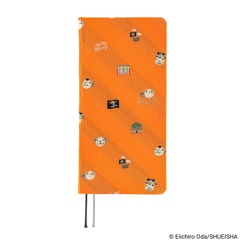 Hobonichi Techo 2027 Weeks ONE PIECE magazine Very Very Merry English planner with orange Going Merry cover. / Agenda en anglais Hobonichi Techo 2027 Weeks ONE PIECE magazine Very Very Merry avec couverture orange Going Merry.