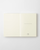 MD Notebook Diary 2027 A6 featuring minimal monthly grid spreads and cream fountain-pen-friendly MD paper. / Agenda MD Notebook Diary 2027 A6 présentant des aperçus mensuels minimalistes et du papier crème MD compatible avec les stylos-plumes.
