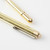 TRAVELER'S COMPANY TRC BRASS Fountain Pen in Solid Brass. A compact pocket pen showing its raw unplated brass cap, golden metal body, steel fine nib, and an industrial iron pocket clip. / Stylo-plume TRAVELER'S COMPANY TRC BRASS en laiton massif. Un stylo de poche compact présentant un capuchon en laiton brut, une plume fine en acier et un clip rétro au fini fer industriel.