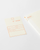 MD Notebook Diary 2027 A5 featuring minimal monthly grid spreads and cream fountain-pen-friendly MD paper. / Agenda MD Notebook Diary 2027 A5 présentant des aperçus mensuels minimalistes et du papier crème MD compatible avec les stylos-plumes.