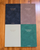 Faded Chronicle 2027 Chronicle Planner B6 Compact edition showing a collection of its 10 unique cover options with an open view of its lay-flat ink-friendly pages. Agenda Faded Chronicle 2027 Chronicle Planner Édition B6 Compact, présentant ses 10 options de couverture uniques et ses pages intérieures plates adaptées aux stylos plume.