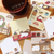 A limited-edition Furukawa Shiko x Kalita Memo Pad - Black Coffee (LM347), showing four assorted paper designs with coffee-themed illustrations, bound together. Un bloc-notes Furukawa Shiko x Kalita en édition limitée - Black Coffee (LM347), présentant quatre motifs de papier assortis avec des illustrations sur le thème du café, reliés ensemble.