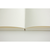 A minimalist MIDORI MD Notebook in A5 size with blank white pages, featuring a white thread-stitched spine and a light paper dust cover. Un carnet MIDORI MD minimaliste au format A5 avec des pages blanches unies, doté d'une reliure cousue fil blanc et d'une couverture de protection en papier léger.