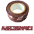 A roll of wide 2.2 cm Classiky Washi tape in brown, featuring a delicate repeating pattern inspired by love letters and correspondence, designed by Mihoko Seki. Un rouleau de ruban Washi Classiky large (2.2 cm) de couleur marron, avec un motif délicat et répétitif inspiré des lettres d'amour et de la correspondance, conçu par Mihoko Seki.
