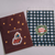 Set of 8 La Dolce Vita Christmas envelopes featuring two designs: a Christmas tree and a festive wreath, made of textured 120g fine wave paper. Lot de 8 enveloppes de Noël La Dolce Vita avec deux motifs (sapin et couronne festive) sur papier texturé 120g.