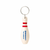 Penco Bowl Pen by Hightide, a wooden ballpoint pen shaped like a bowling pin with a keychain attachment, available in White, Red, Yellow, and Blue. Stylo Penco Bowl par Hightide, un stylo à bille en bois en forme de quille de bowling avec un porte-clés, disponible en blanc, rouge, jaune et bleu.