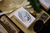 OURS Central Post A Rubber Stamp Set of 5. Vintage-style botanical postmarks, lily of the valley, and postal symbols on compressed wood blocks. Ensemble de 5 tampons en caoutchouc OURS Central Post A. Motifs de cachets de poste botaniques rétro, muguet et symboles postaux sur bois.
