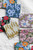 Lin Chia Ning "Woven" Label Sticker Set. Six square stickers with vintage woven-style textile and botanical patterns. Lot de stickers "Woven" par Lin Chia Ning. Six autocollants carrés avec des motifs textiles et botaniques de style étiquette tissée vintage.
