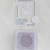 Lin Chia Ning "Frost Sakura" Four Seasons Ink Pad. A small square ink pad in a muted, pale purple color for subtle and artistic stamping. Encreur Lin Chia Ning "Frost Sakura" de la série Quatre Saisons. Un petit tampon encreur carré de couleur violet pâle pour des impressions délicates.