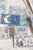 A 3.5cm wide clear PET tape by Lin Chia Ning featuring travel illustrations like airplane windows, weather icons, and luggage. Un ruban PET transparent de 3,5 cm de large par Lin Chia Ning, illustré de motifs de voyage comme des hublots d'avion, des icônes météo et des bagages.