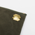 THE SUPERIOR LABOR Paraffin Canvas Pouch #03. A long, rugged waxed canvas organizer pouch with a brass zipper, shown in 6 vintage-inspired colors. Pochette en toile paraffinée #03 par THE SUPERIOR LABOR. Une grande trousse robuste en toile cirée avec zip en laiton, disponible en 6 couleurs vintage.