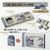 PLUS Mount Fuji Air-In Eraser Banknote Special Edition box set showing two dark green erasers side-by-side inside a novelty Japanese currency slide-box. One eraser is worn down into a white snow-capped mountain peak shape. Coffret de gommes PLUS Mount Fuji Air-In Édition Spéciale Billet de Banque. Comprend deux gommes vert foncé présentées dans une boîte fantaisie en forme de billet japonais, dont une s'est usée pour former un mont Fuji enneigé.