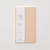 TAKEO PAPER Dressco Stitch Notebook Vellum edition. A slim, palm-sized notebook featuring a leather-textured vellum tan paper cover, stitched spine, and premium blank Bank Paper pages embedded with a Three Diamonds watermark. / Carnet cousu TAKEO PAPER Dressco Édition Vellum. Un carnet de poche mince arborant une couverture en papier vellum beige texture cuir, une reliure cousue et des pages blanches en papier de banque haut de gamme.
