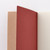 TAKEO PAPER Dressco Stitch Notebook Vellum edition. A slim, palm-sized notebook featuring a leather-textured vellum tan paper cover, stitched spine, and premium blank Bank Paper pages embedded with a Three Diamonds watermark. / Carnet cousu TAKEO PAPER Dressco Édition Vellum. Un carnet de poche mince arborant une couverture en papier vellum beige texture cuir, une reliure cousue et des pages blanches en papier de banque haut de gamme.