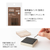 Midori pre-inked paintable stamp Bread theme in a brown square body. Shows a soft brown ink frame pattern with hand-drawn bakery motifs designed by Sayo Koizumi. / Tampon auto-encreur à peindre Midori thème Pain, boîtier carré marron. Montre un motif de cadre à l'encre marron clair avec des motifs de boulangerie conçus par Sayo Koizumi.