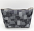 Luddite Denim Boat Pouch M in unique random patchwork Okayama denim from the Authentic Denim series. Compact boat-shaped design with metal zipper, internal zippered divider pocket, and vintage workwear stitching and labels. One-of-a-kind pattern placement. Made in Japan. Pochette bateau en denim Luddite M au motif patchwork aléatoire unique en denim Okayama de la série Authentic Denim. Design compact en forme de bateau avec fermeture éclair métallique, poche intérieure zippée et détails workwear vintage (coutures et étiquettes). Motif unique sur chaque pièce. Fabriquée au Japon.