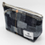 Luddite Denim Boat Pouch S in expressive Jacquard patchwork Okayama denim from the Authentic Denim series. Compact boat-shaped design with metal zipper, internal zippered divider pocket, and vintage workwear stitching and labels. Made in Japan. Pochette bateau en denim Luddite S au motif patchwork Jacquard expressif en denim Okayama de la série Authentic Denim. Design compact en forme de bateau avec fermeture éclair métallique, poche intérieure zippée et détails workwear vintage (coutures et étiquettes). Fabriquée au Japon.