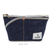 Luddite Denim Boat Pouch S in solid rigid Okayama denim from the Authentic Denim series. Compact boat-shaped design with metal zipper, internal zippered divider pocket, and vintage workwear stitching and labels. Made in Japan. Pochette bateau en denim Luddite S en denim Okayama rigide uni de la série Authentic Denim. Design compact en forme de bateau avec fermeture éclair métallique, poche intérieure zippée et détails workwear vintage (coutures et étiquettes). Fabriquée au Japon.